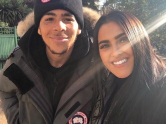 Che Adams with his partner Amelia Kate 